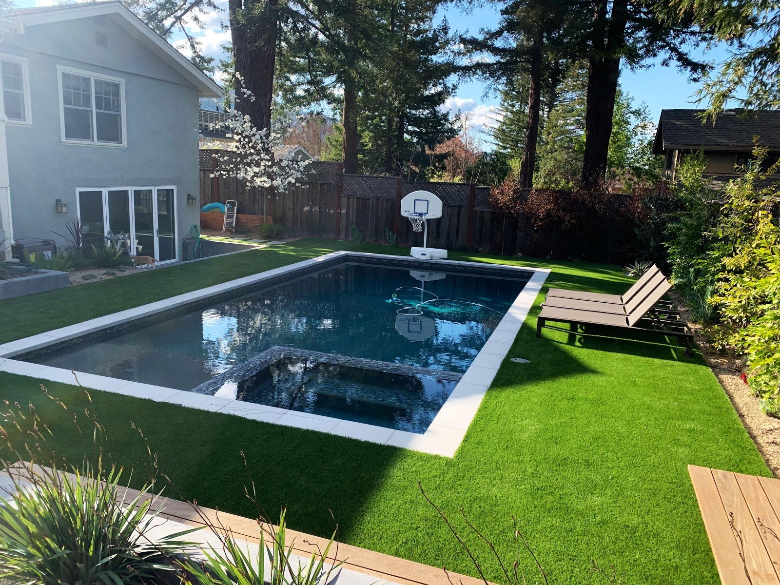 Transforming Your Pool Area with Artificial Grass: Tips and Ideas