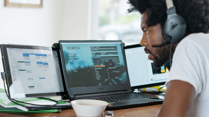 Spring Break Travel: Stay Productive with a Triple Portable Monitor for Your Laptop