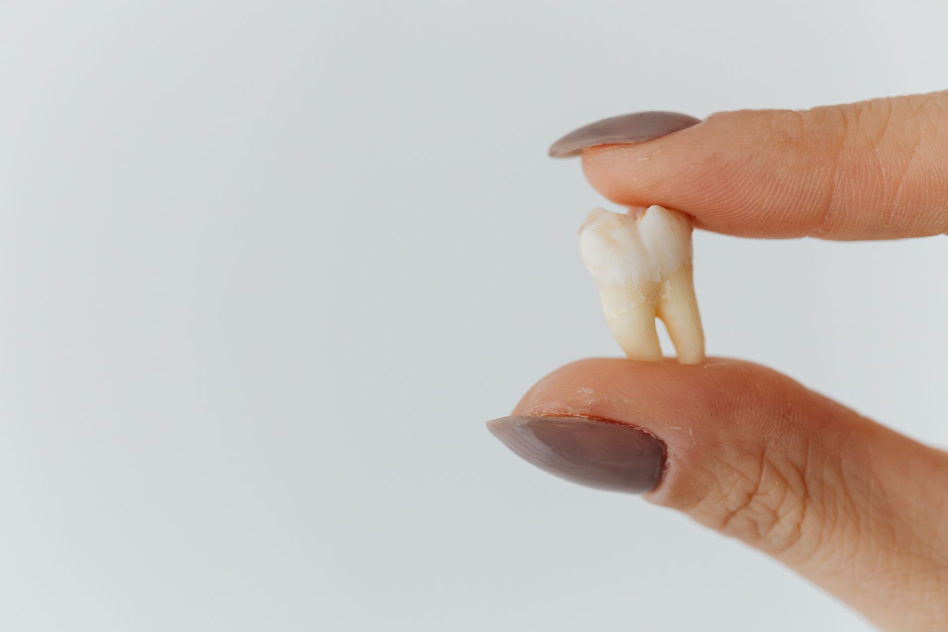 stuck baby tooth